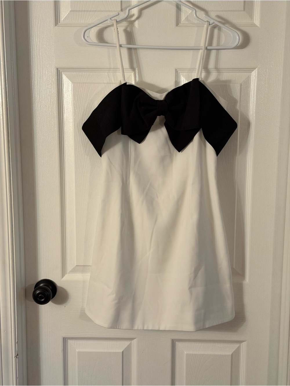 White Strapless Dress with Black Bow Accent